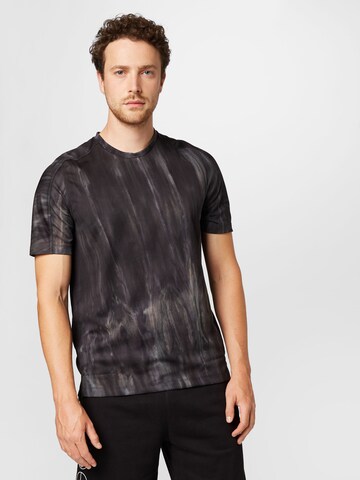 T-Shirt fonctionnel 'Overspray Graphic' ADIDAS SPORTSWEAR en noir : devant