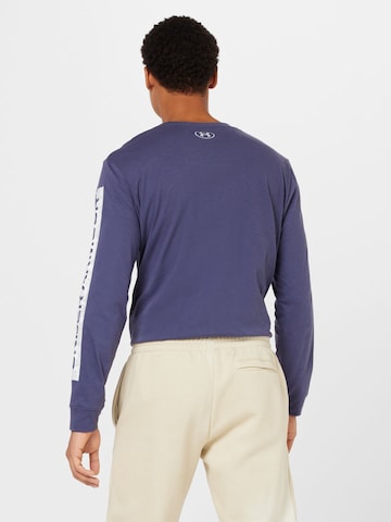 UNDER ARMOUR - Sweatshirt de desporto em cinzento