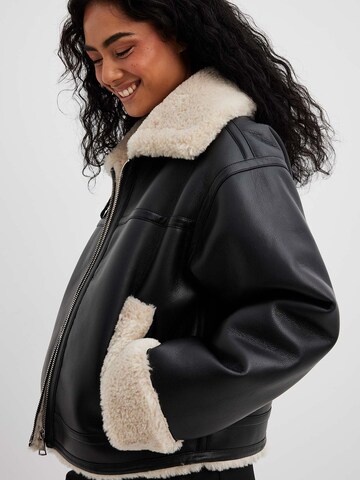 NA-KD Between-Season Jacket in Black: front