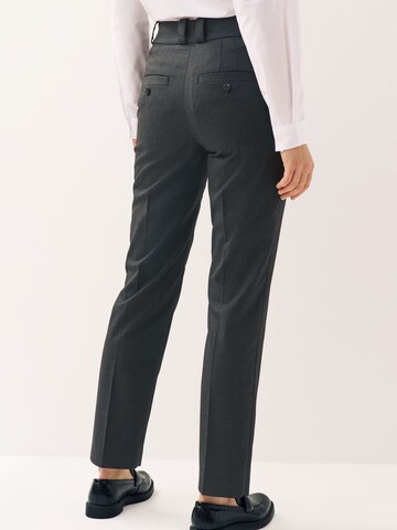 Slimfit Pantaloni con piega frontale di Next in grigio