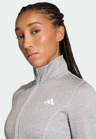 ADIDAS PERFORMANCE - Chaqueta de chándal en gris