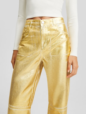 Bershka Szeroka nogawka Spodnie w kolorze złoty