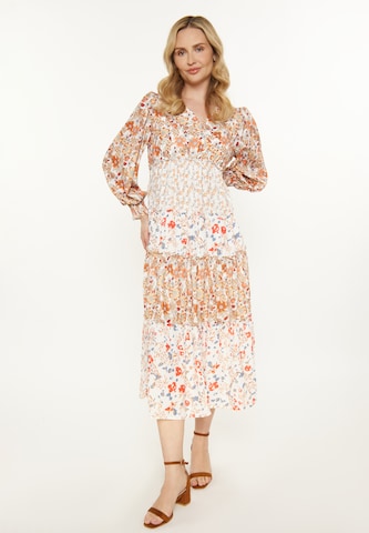 Usha Jurk in Oranje