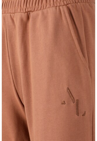 Athlecia Tapered Sportbroek 'Lia' in Bruin