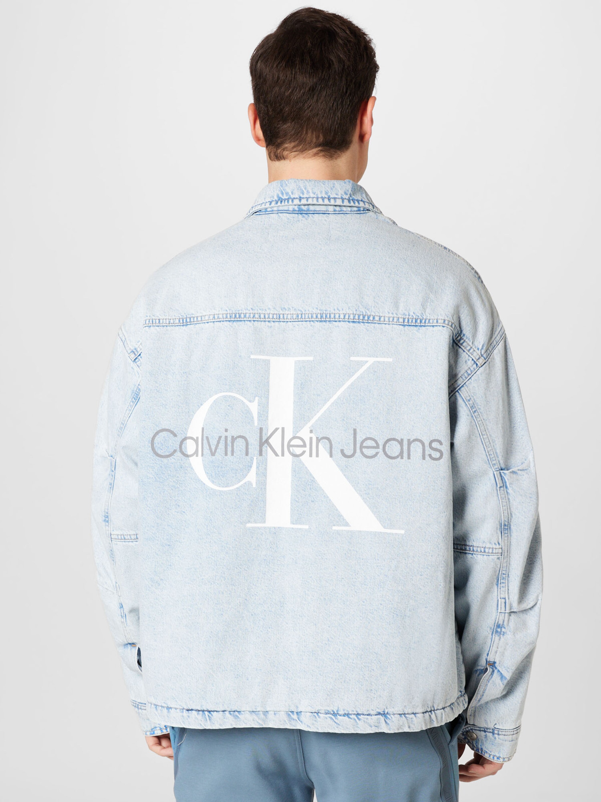 Calvin Klein Jeans Between-Season Jacket in Light Blue | ABOUT YOU