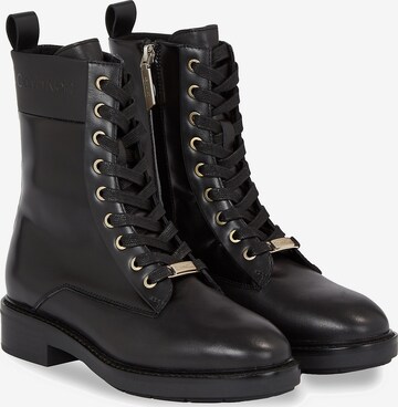 Calvin Klein Lace-Up Ankle Boots in Black