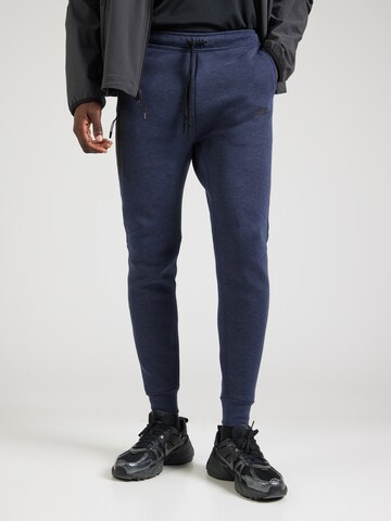 Nike Sportswear Zúžený Kalhoty 'TECH FLEECE' – modrá: přední strana