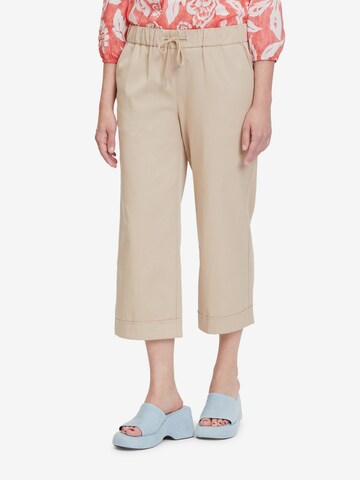 Cartoon Regular Pants in Beige: front