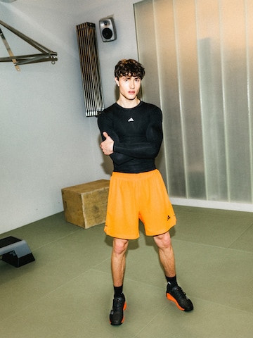 Regular Pantaloni sport 'D4T POWER' de la ADIDAS PERFORMANCE pe portocaliu