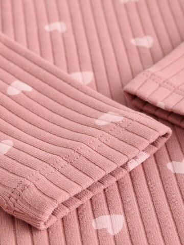 Set Next en rose