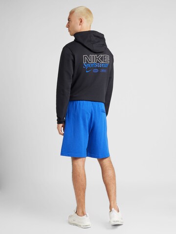Loosefit Pantalon 'CLUB' Nike Sportswear en bleu