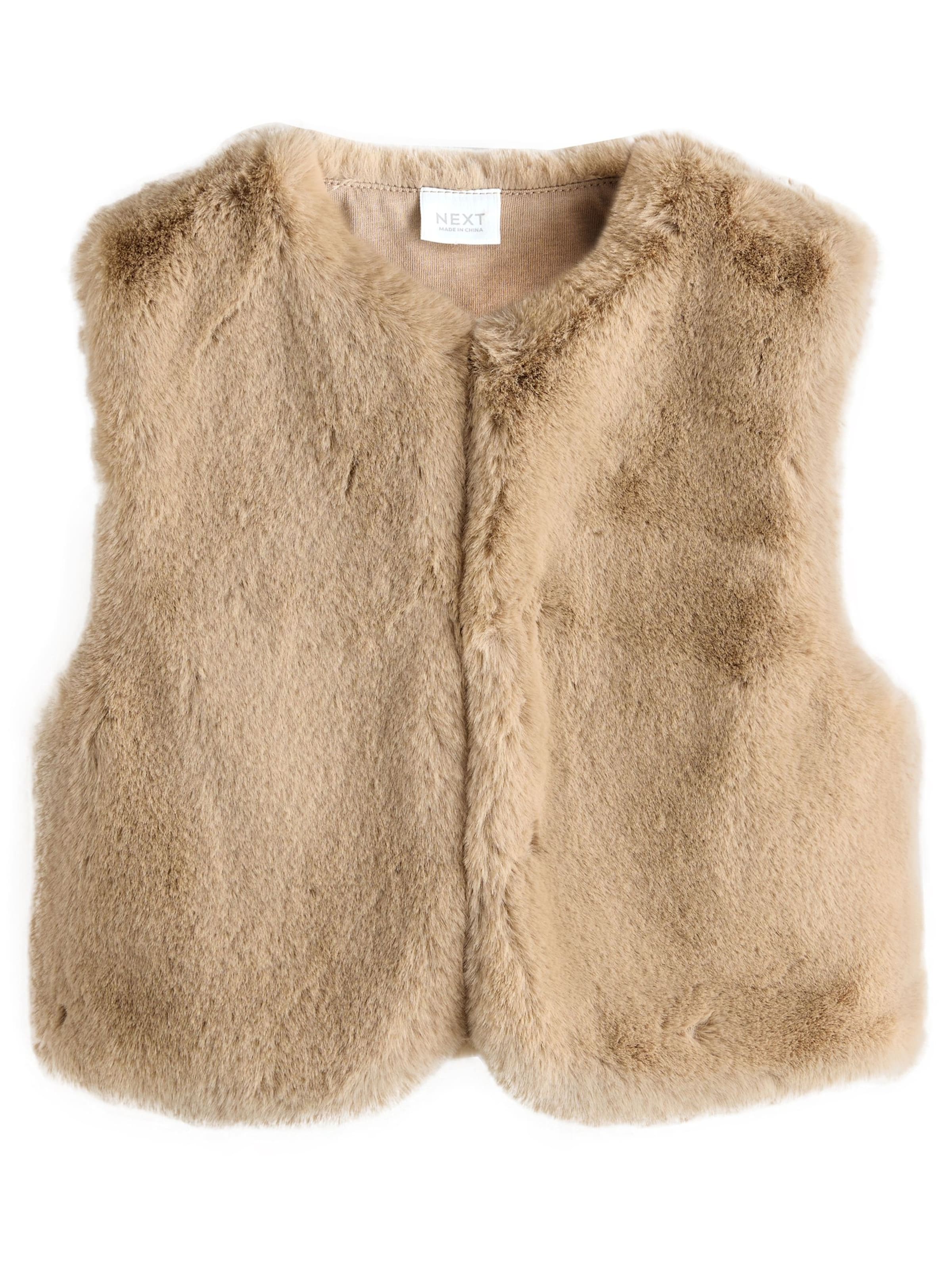 Next Vest i brun: forside