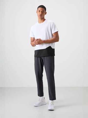 T-Shirt fonctionnel Tommy Life en blanc