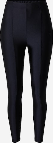 Reebok Skinny Leggings 'RESPECT HER' in Zwart: voorkant