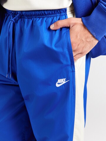 mėlyna Nike Sportswear Siaurėjantis Kelnės