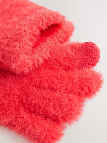 Next - Guantes en rojo