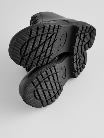 Bottes Next en noir