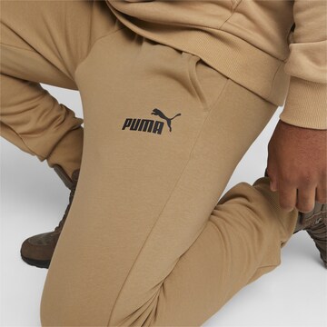 PUMA Tapered Sportbroek in Beige