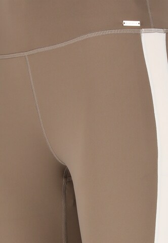 Athlecia Skinny Sports trousers 'Lris' in Brown