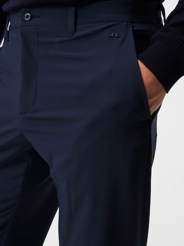 Effilé Pantalon de sport J.Lindeberg en bleu