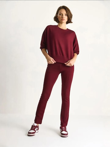 Tuta da jogging di Bianco Lucci in rosso: frontale