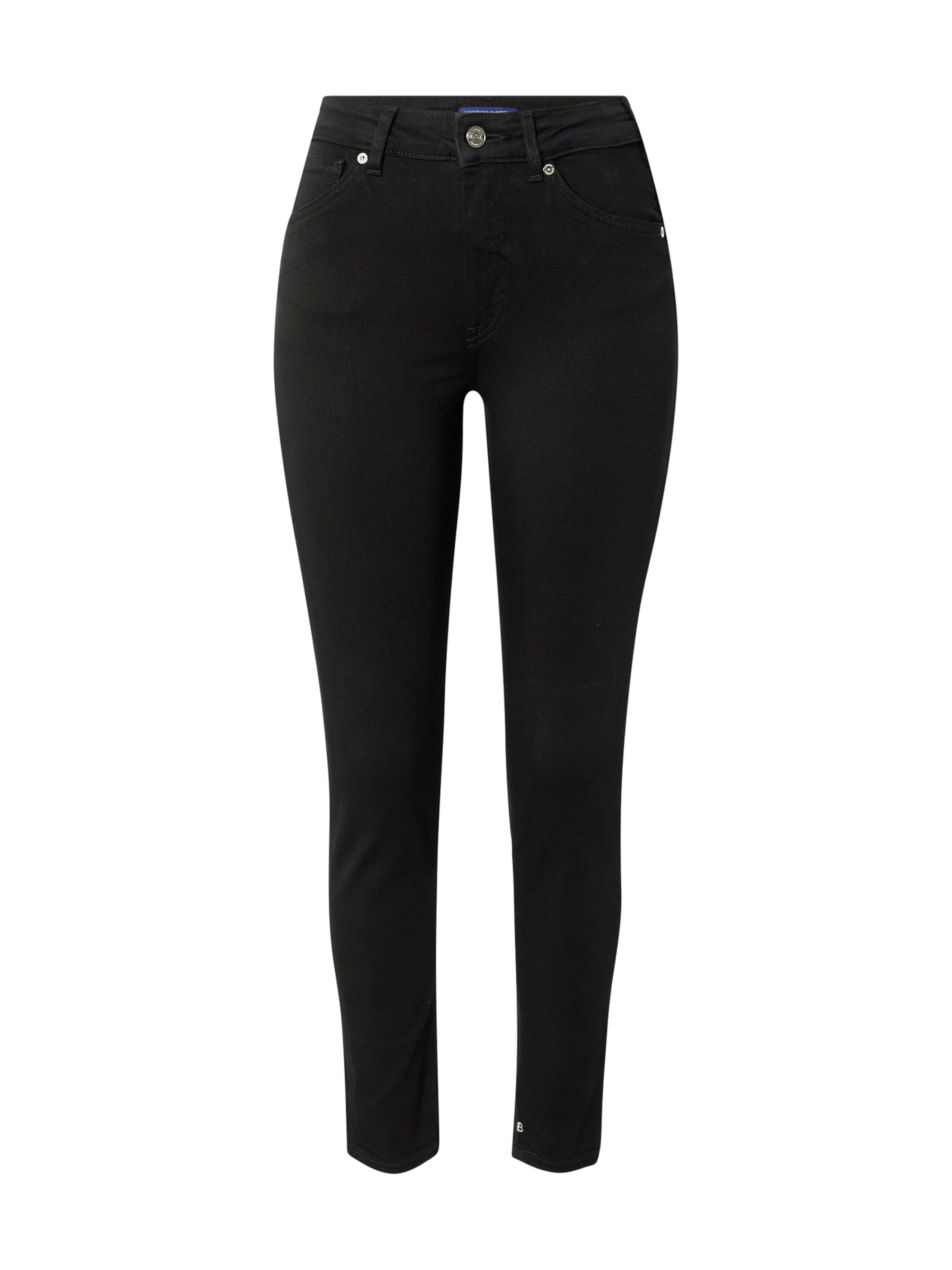 Skinny Jean 'Seasonal essentials Haut skinny jeans' SCOTCH & SODA en noir : devant