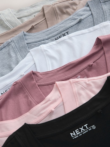 Tricou de la Next pe gri