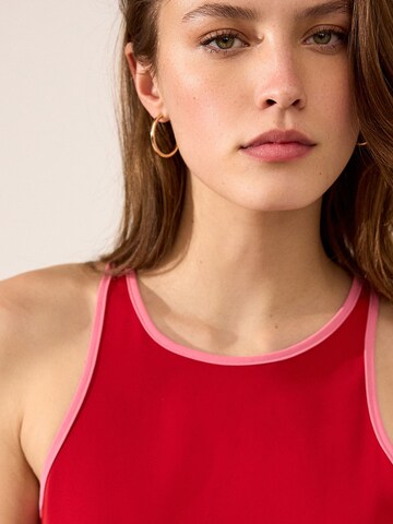 Next - Jumpsuit en rojo