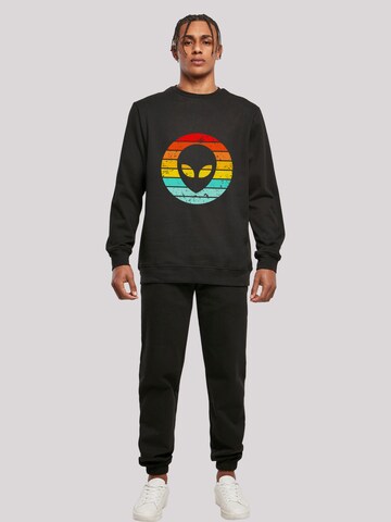 Sweat-shirt 'Alien Retro Sonnenuntergang' F4NT4STIC en noir