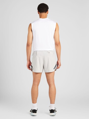 NIKE Normální Sportovní kalhoty – šedá