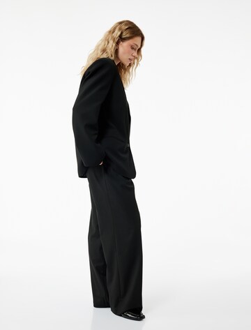 Koton Wide Leg Bundfaltenhose in Schwarz