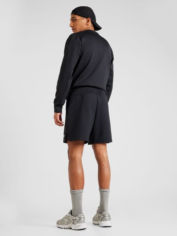 new balance Regular Sportshorts in Schwarz