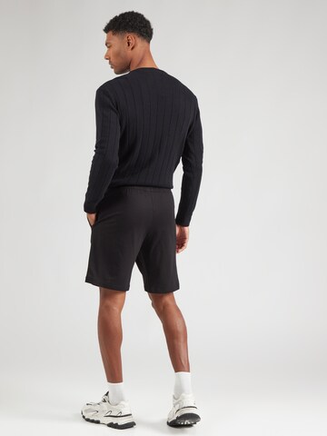 Loosefit Pantalon EA7 Emporio Armani en noir