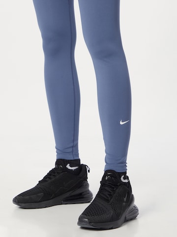 NIKE Skinny Športové nohavice 'One' - Modrá