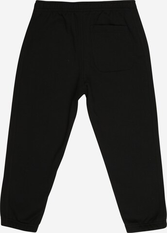 Effilé Pantalon Urban Classics en noir