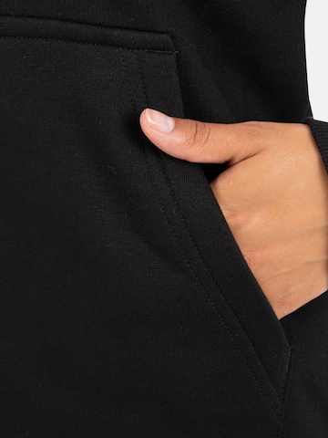 Veste de survêtement ' Saria ' Smilodox en noir