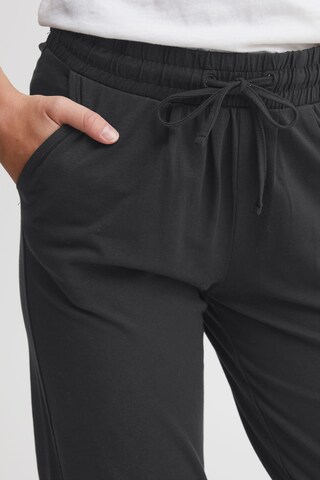 Oxmo - Tapered Pantalón 'Odette' en negro