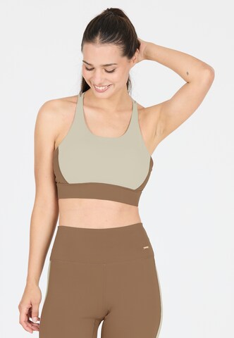 Athlecia Low Support Sport-BH 'Aspasia' in Grau: Vorderseite