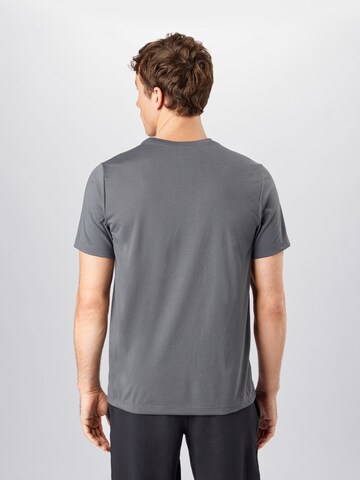 Coupe regular T-Shirt fonctionnel 'Athlete' NIKE en gris