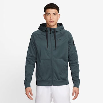 Veste de survêtement NIKE en vert : devant