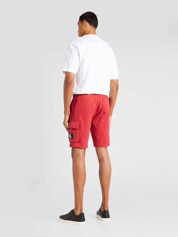 Calvin Klein Jeansregular Cargo hlače - crvena boja