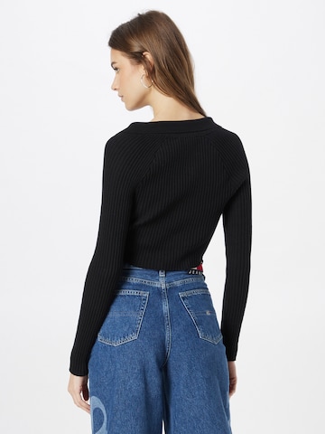 Pull-over Tommy Jeans en noir