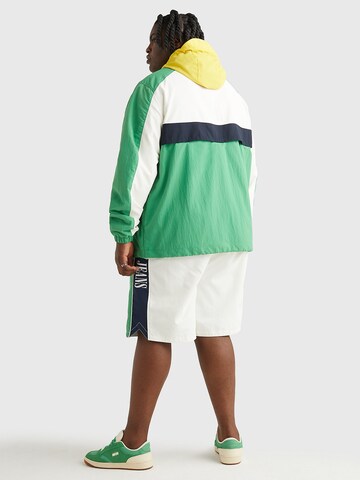 Tommy Jeans Plus Between-Season Jacket 'Chicago' in Green