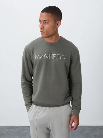 Sweat-shirt Tommy Life en vert
