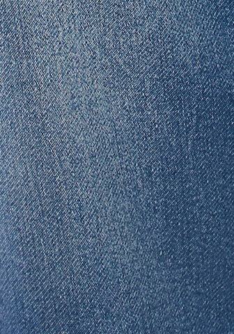 JOHN DEVIN Tapered Jeans in Blau