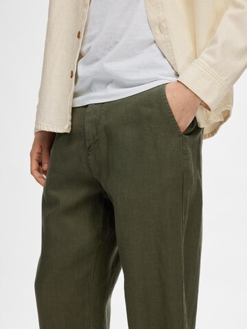 SELECTED - Loosefit Pantalón 'SLHMAGNUS' en verde