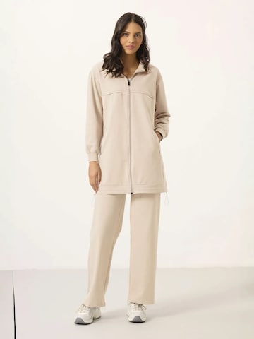 Tuta da jogging di Tommy Life in beige: frontale