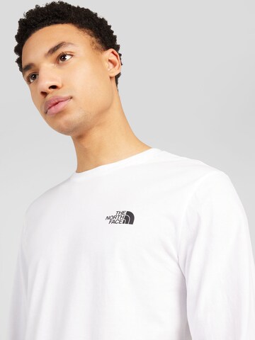 THE NORTH FACE T-shirt i vit