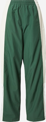 žalia Nike Sportswear Plačios klešnės Kelnės: priekis