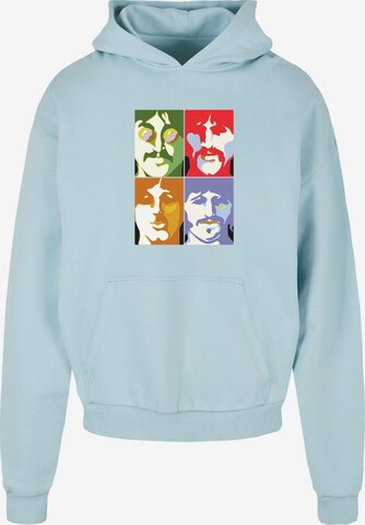 Merchcode Sweatshirt 'Beatles -  Color Heads' in Blau: predná strana